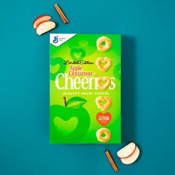 Instagram post featuring Limited Edition Apple Cinnamon Happy Heart Shapes Cheerios Cereal. - Link to social post