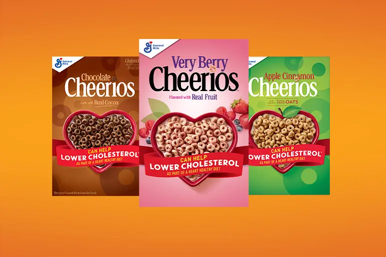 Group of 3 Cheerios Flavor Bundle cereals, Chocolate, Very Berry, Apple Cinnamon.