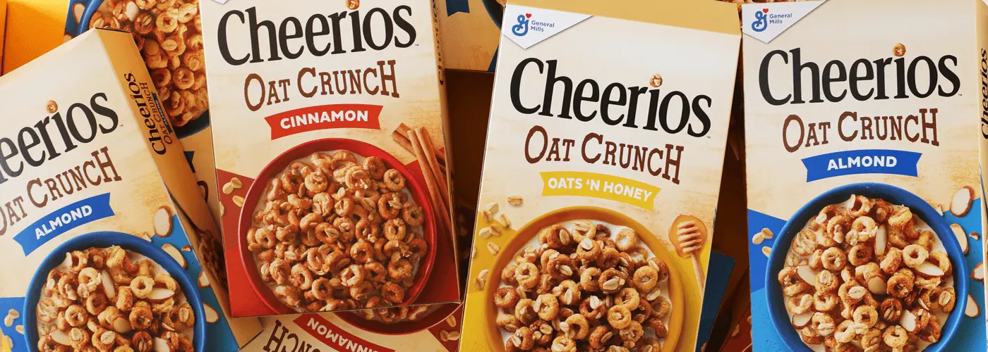 Group of Cheerios Oat Crunch cereal boxes, Oats 'N Honey, Almond, Cinnamon.