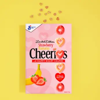 Instagram post featuring Limited Edition Strawberry Banana Happy Heart Shapes Cheerios Cereal. - Link to social post