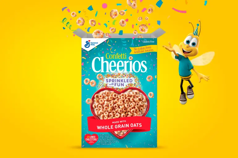 Confetti Cheerios pack shot image with text on it made with whole grain and no colors from artificial sources